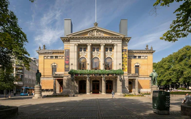 National Theatre facade in Oslo during a walking tour.