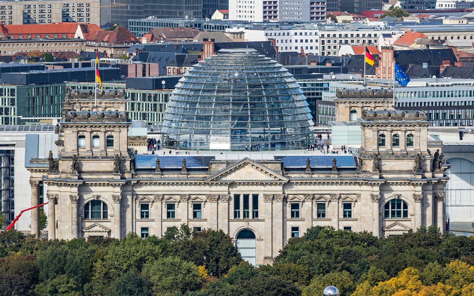 Reichstag building with glass dome in Berlin, Germany, viewed from Platz der Republik.