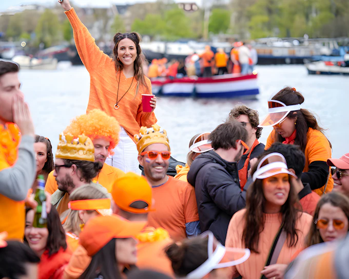 Amsterdam: 1.5-Hour King's Day Party Cruise with Unlimited Drinks & Music