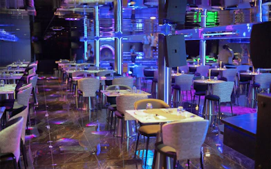 Luxurious dining area on Super Galaxy Chao Phraya River Dinner Cruise, Bangkok.