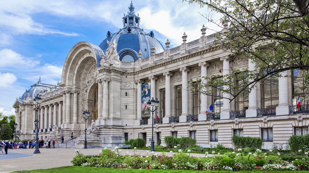 Petit Palais exterior with ornate columns and dome in Paris, France.