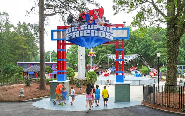Visitors entering DC Super Friends area at Six Flags Over Georgia.