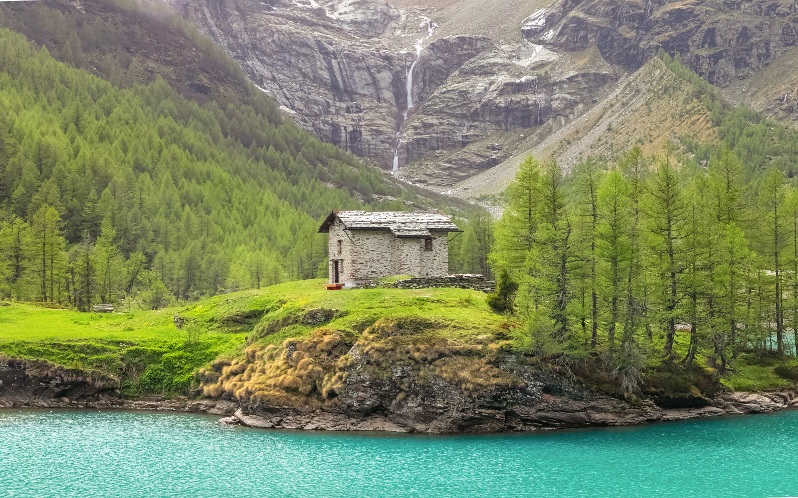 Summer feels at the Alp Grum lake with lush greenery, clear lake and quiet mormings