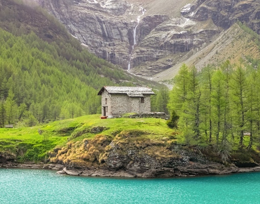 Summer feels at the Alp Grum lake with lush greenery, clear lake and quiet mormings