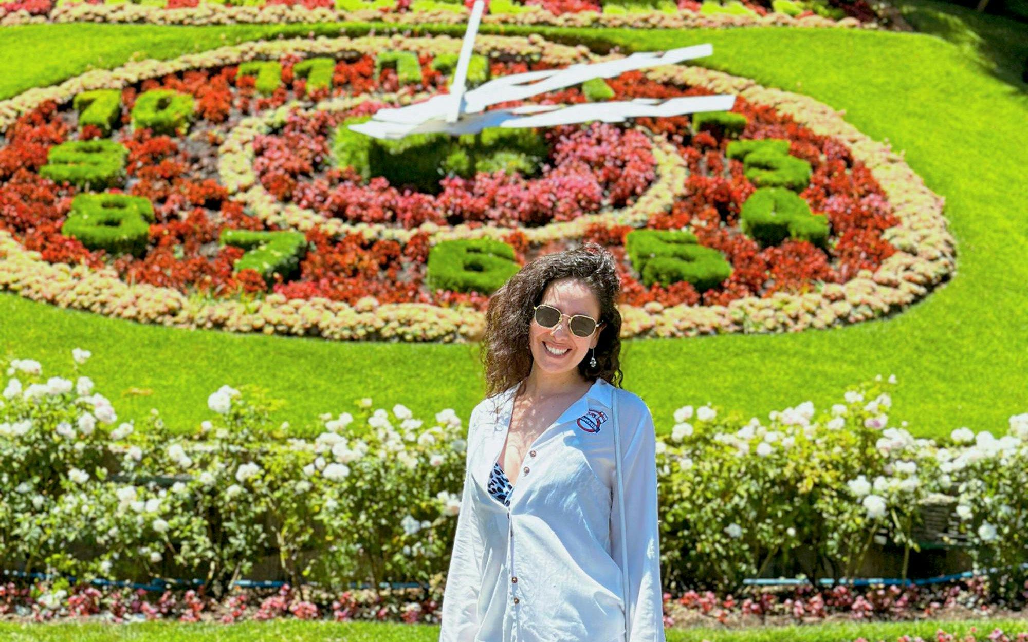 Flower Clock in Viña del Mar, Chile with colorful floral design in the background.