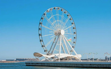 Ferris wheel on Baku Boulevard during guided walking tour of city highlights.