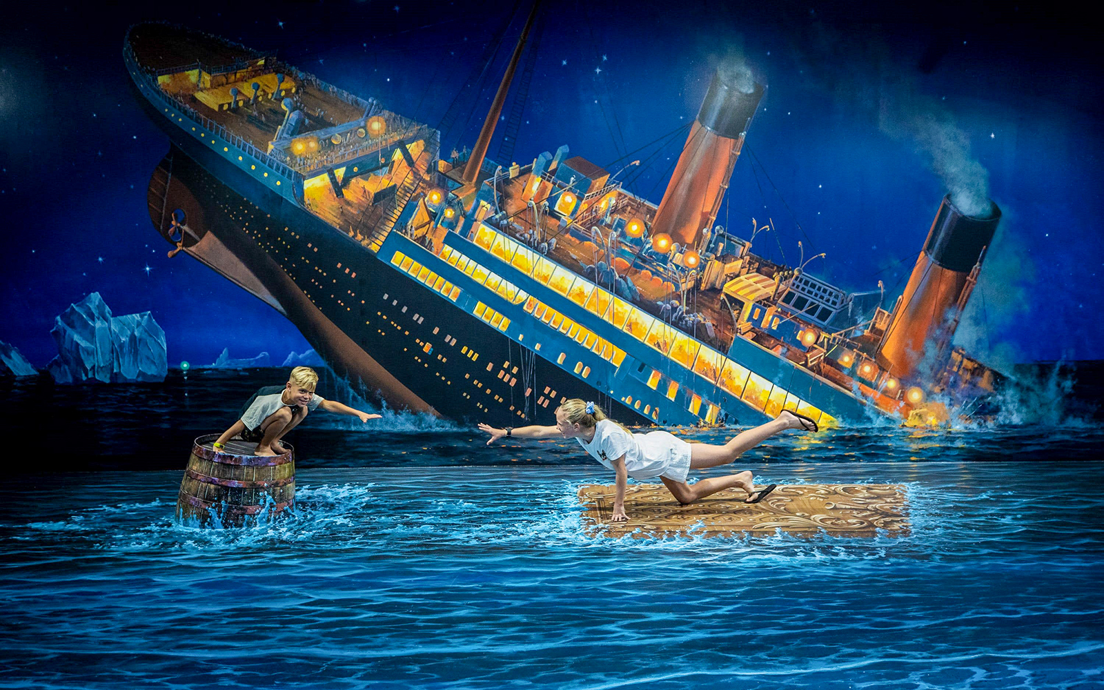 People interacting with Titanic illusion at ArtVo Illusions, Gold Coast.