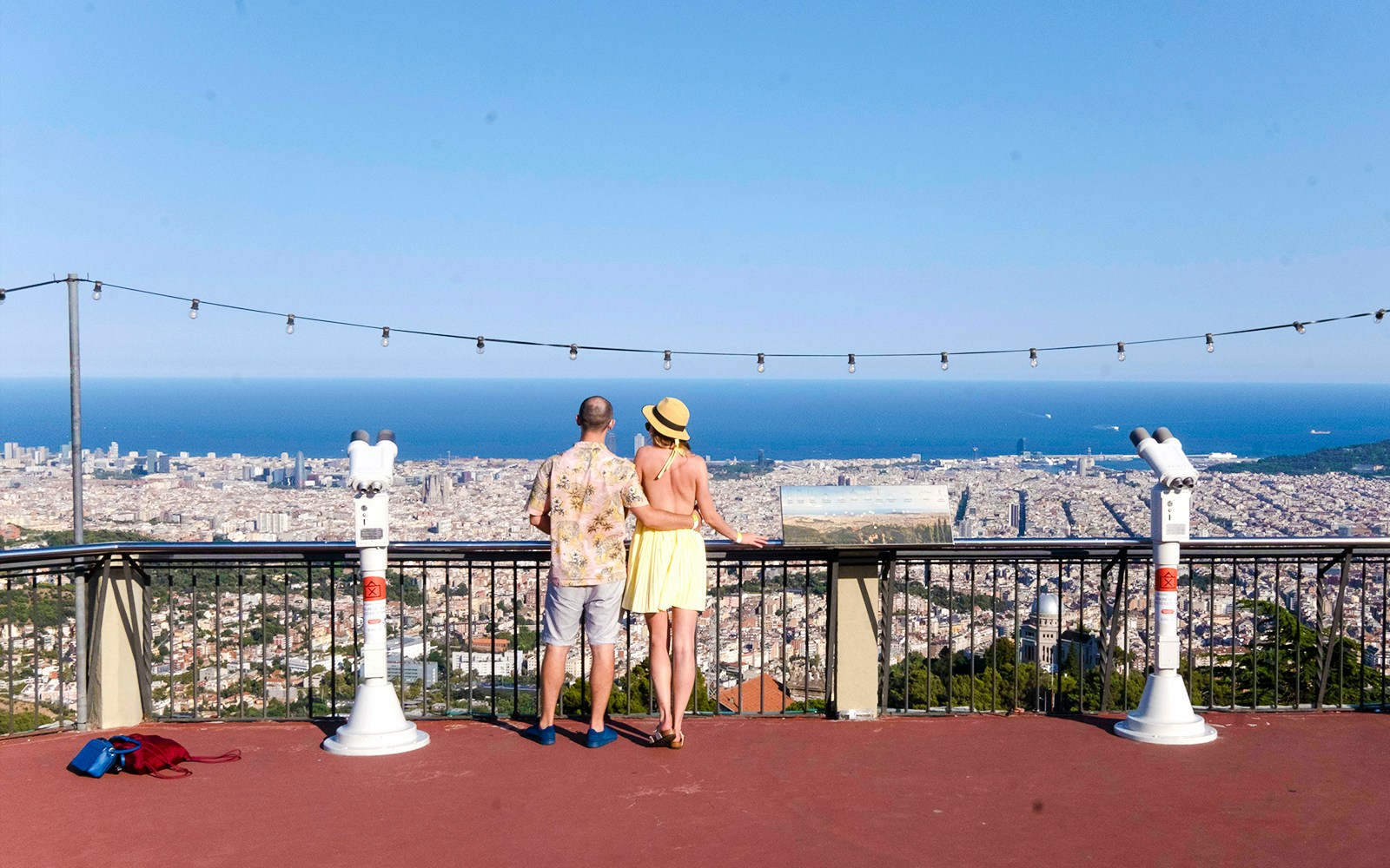 Visitors enjoying the view of Barcelona from Tibidabo Amusement Park.