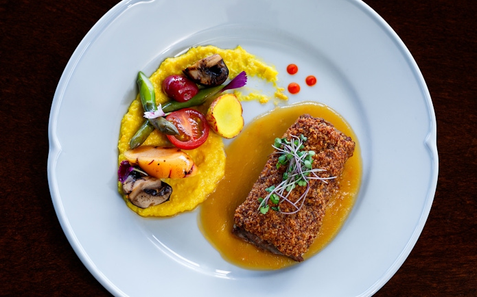 Premium meal with vegetables and sauce served on Perito Moreno, Spegazzini & Upsala tour.