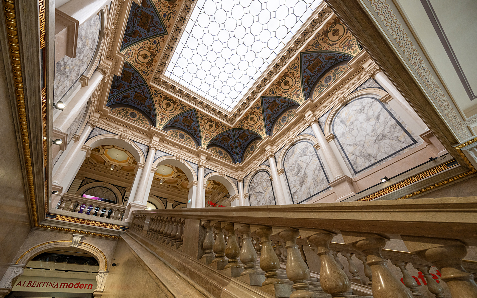 Interior staircase and ornate ceiling of ALBERTINA MODERN Vienna.