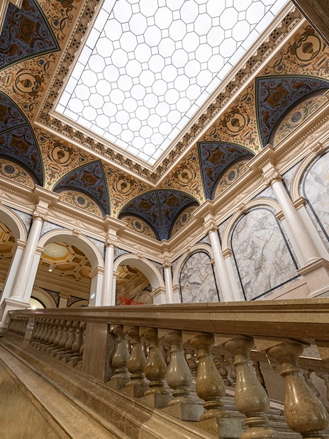 Interior staircase and ornate ceiling of ALBERTINA MODERN Vienna.