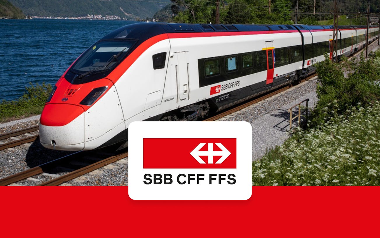 Train on tracks near Basel Euro Airport with SBB CFF FFS logo.
