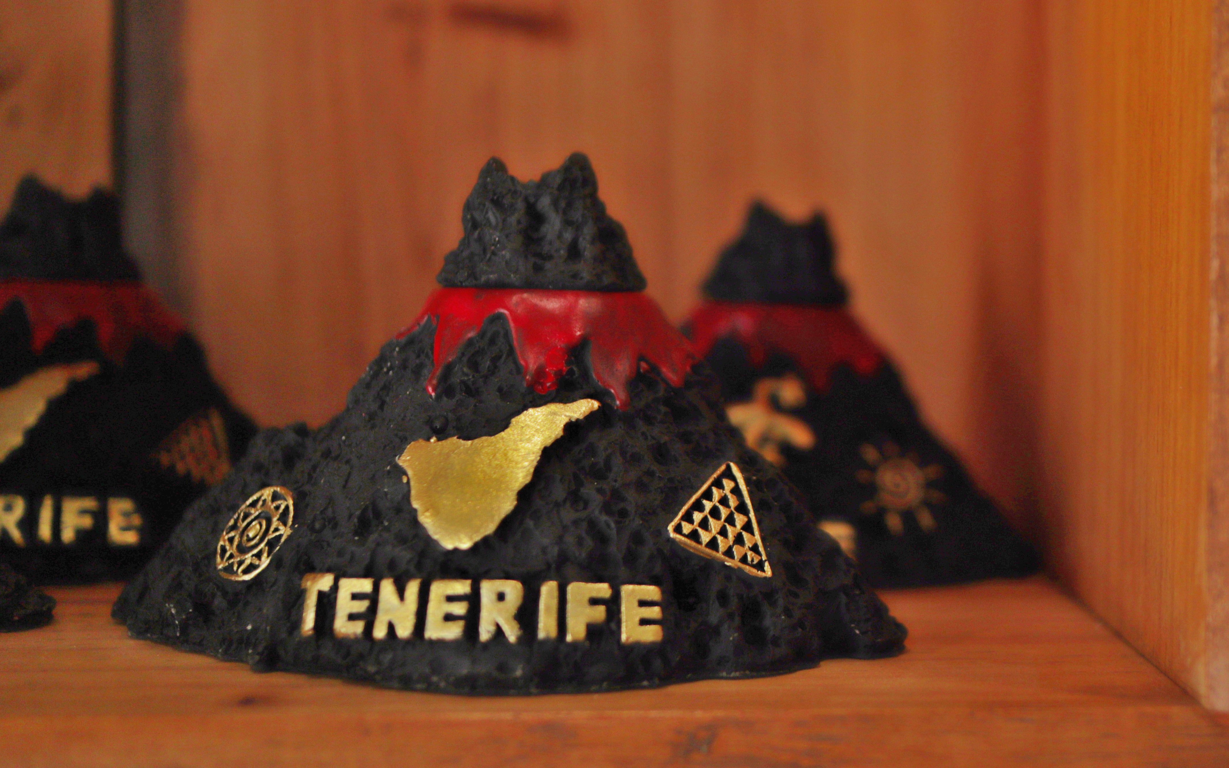 Tenerife souvenir volcano model with island map in a shop.