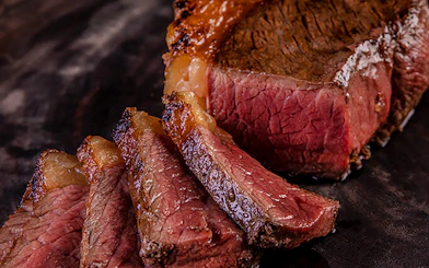 Sliced grilled meat at a Brazilian steakhouse in Rio de Janeiro.