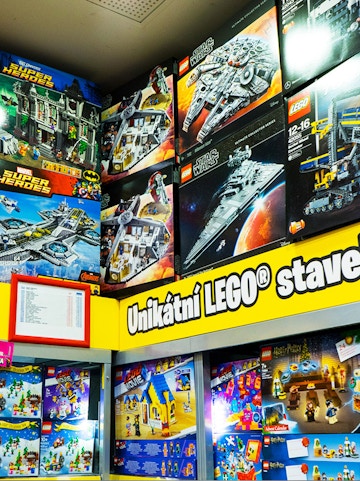 LEGO sets display at LEGO Museum Prague featuring Star Wars and Super Heroes themes.