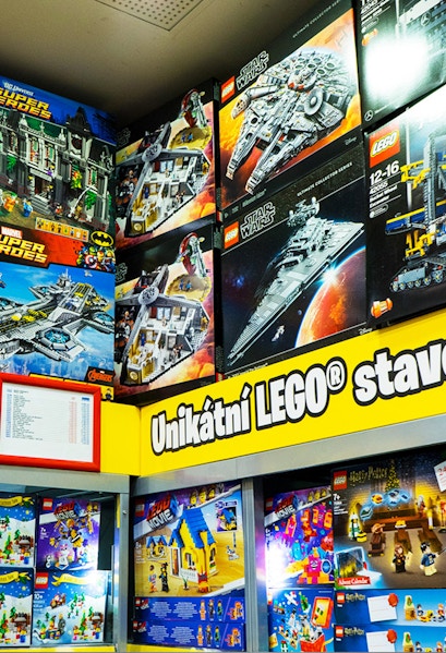 LEGO sets display at LEGO Museum Prague featuring Star Wars and Super Heroes themes.