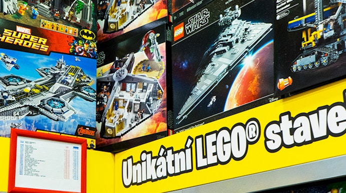 LEGO sets display at LEGO Museum Prague featuring Star Wars and Super Heroes themes.
