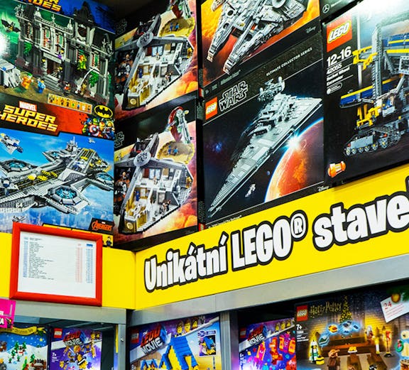 LEGO sets display at LEGO Museum Prague featuring Star Wars and Super Heroes themes.