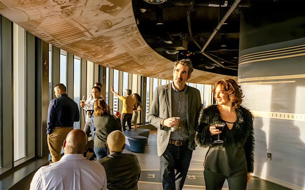 People enjoying the view on the 37th floor of Vue Orleans Observation Deck.