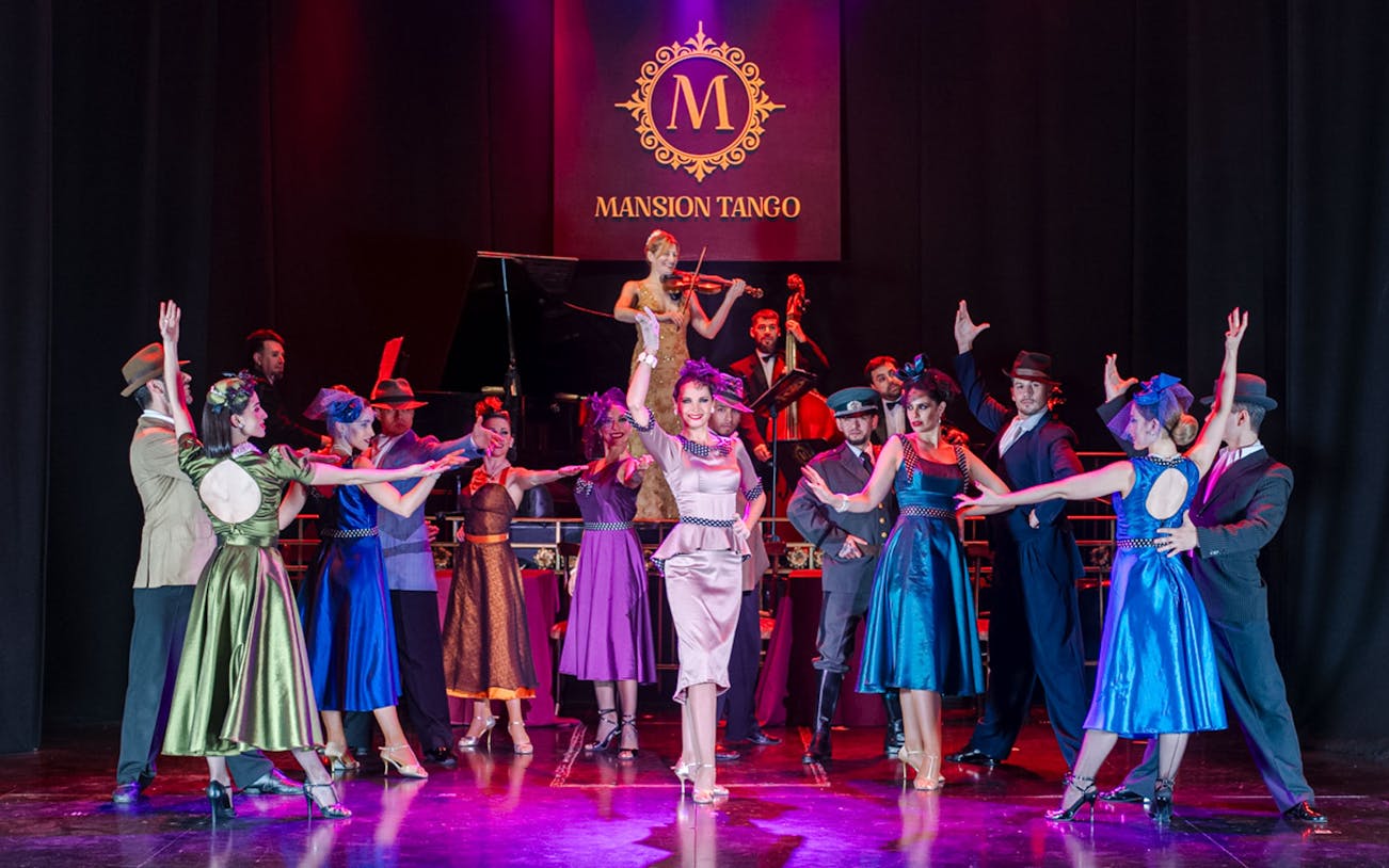 Tango dancers performing at Mansión Tango Show in Buenos Aires, Argentina.