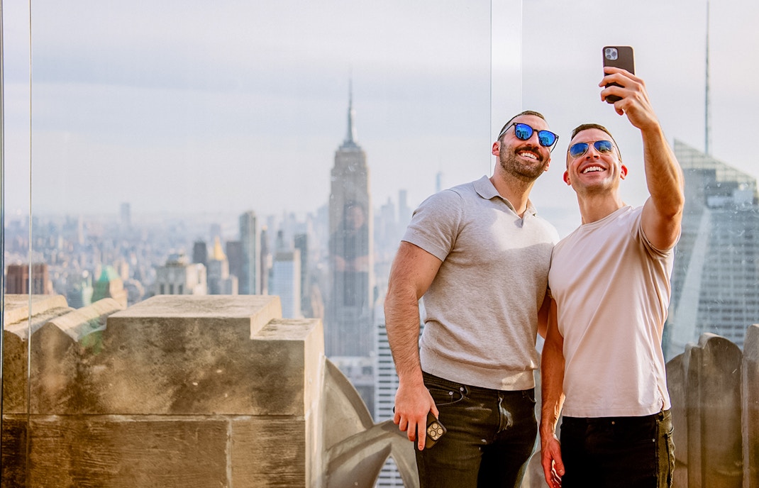 Men taking a selfie at Top of the Rock, Rockefeller Center, New York