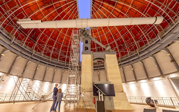 Observatory interior with large telescope, French Riviera Pass experience.