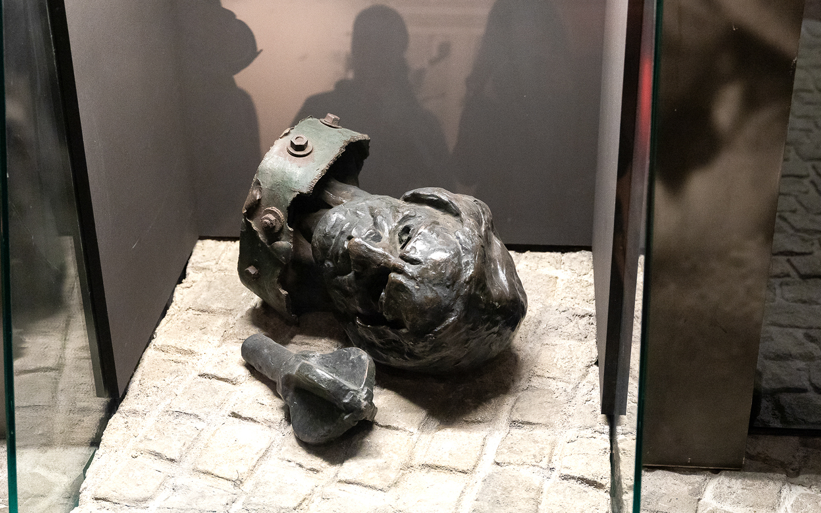 Sculpture of a head inside Oskar Schindler's Factory exhibit.