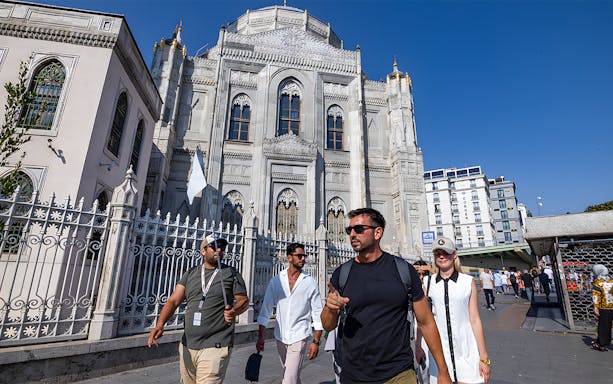 Tourists walking near Topkapi Palace in Istanbul's Old City.
