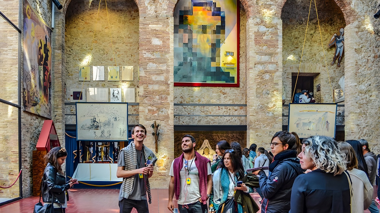 Visitors inside the courtyard of the Dalí Theatre and Museum, Figueres, Catalonia, Spain.
