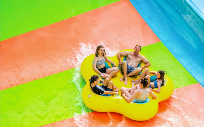 Group enjoying a raft ride at Aquatica Orlando water park.