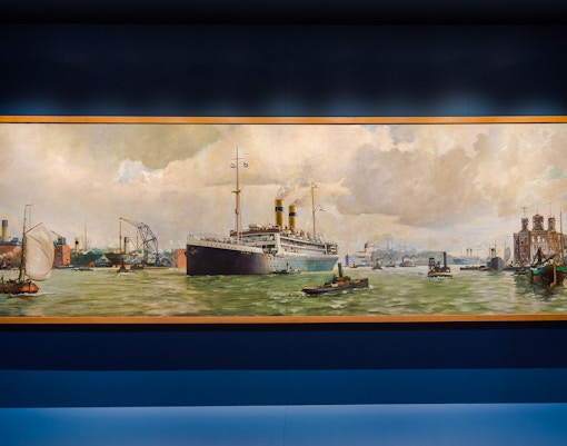 Amsterdam Port City exhibit at The National Maritime Museum showcasing historic ships and maritime artifacts.