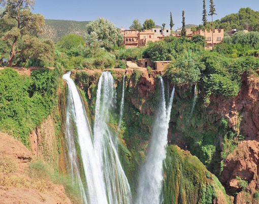 Ouzoud Waterfall in Morocco is an enclave of green and cooling water, popular spot for natives and a destination of one day tourist tours.