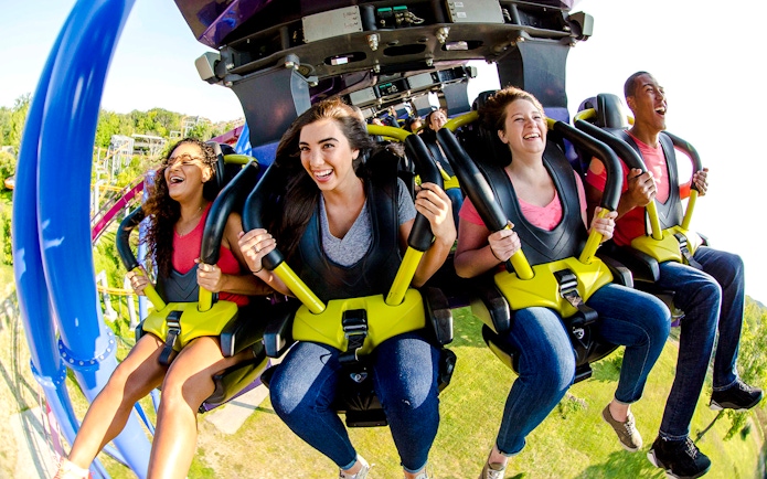 Riders enjoying the Banshee roller coaster at Kings Island.