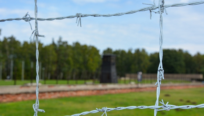 Stutthof concentration camp entrance gate during Warsaw tour with lunch.