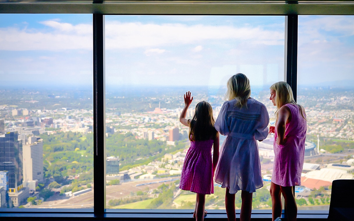 People enjoying the cityscape from Melbourne Skydeck.