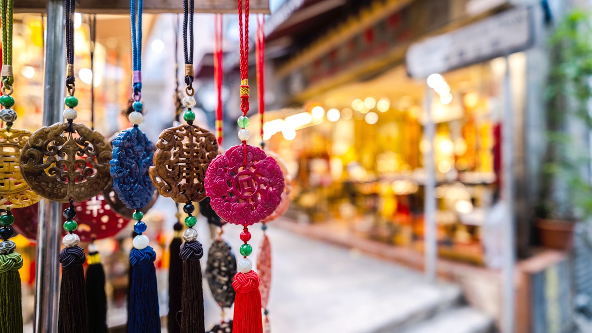 Hanging jade ornaments in a Hong Kong souvenir shop.