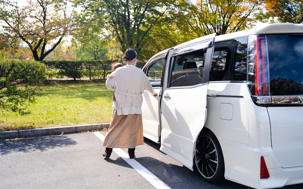 Guests boarding van for Kravica Waterfalls, Mostar, Konjic, Počitelj & Blagaj day trip from Sarajevo.