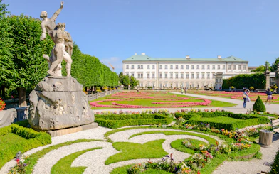 Mirabell Gardens with Pegasus Fountain and Mirabell Palace in Salzburg, Austria.