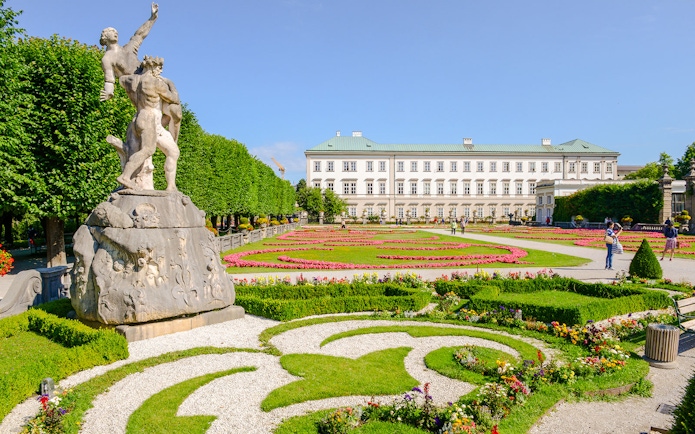 Mirabell Gardens with Pegasus Fountain and Mirabell Palace in Salzburg, Austria.