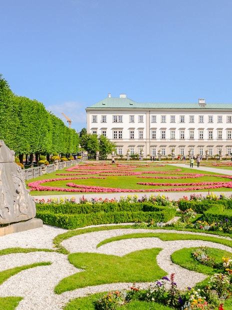 Mirabell Gardens with Pegasus Fountain and Mirabell Palace in Salzburg, Austria.