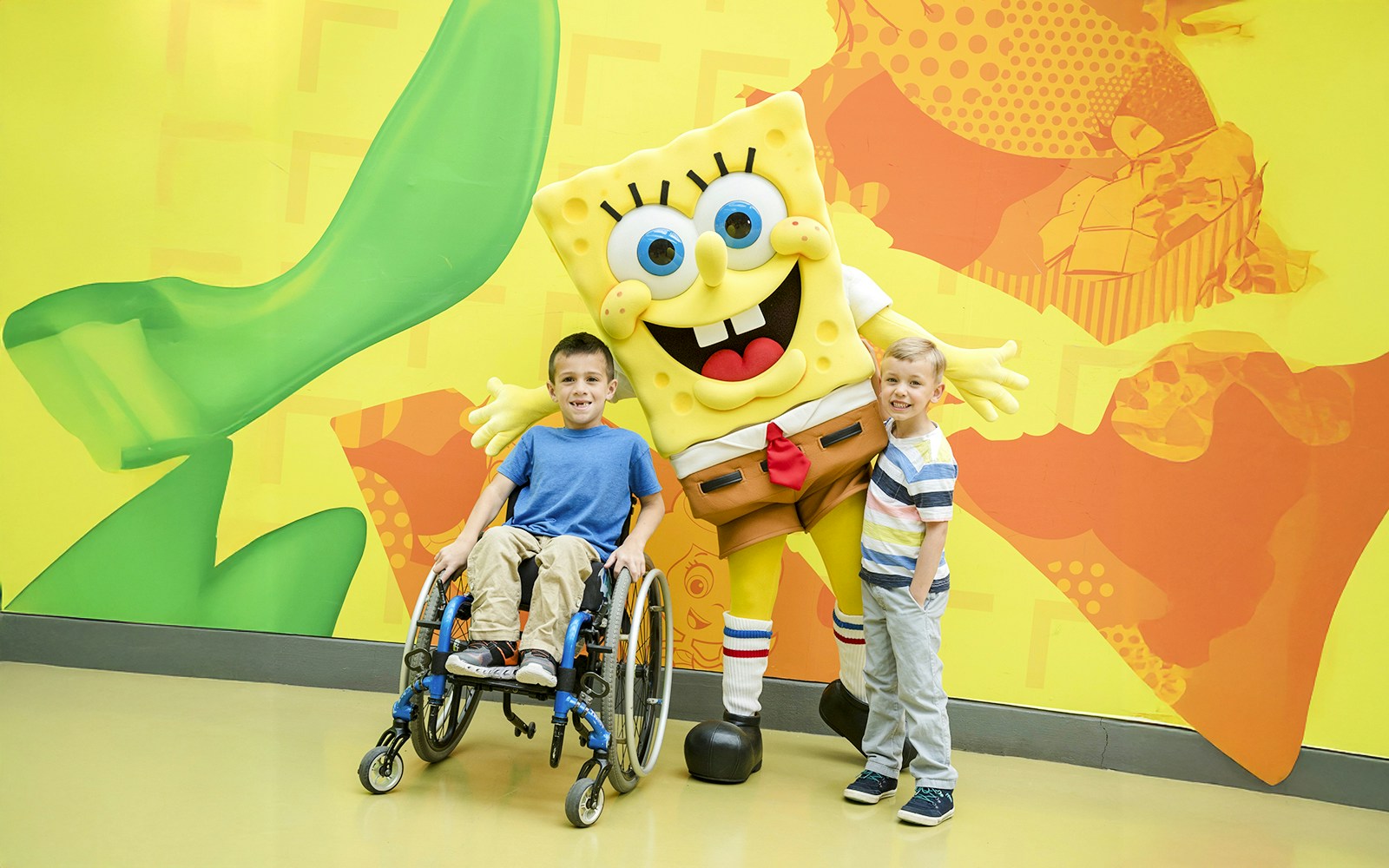 Young kids with Spongebob at Nickelodeon Universe, Mall of America.