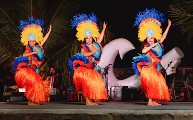 Dancers performing traditional Hawaiian hula at Mauka Warriors Luau.
