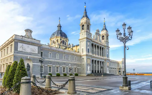 Almudena Cathedral exterior in Madrid, part of the self-guided city exploration game.