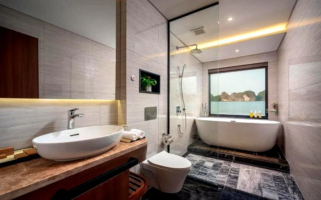 Luxury bathroom with ocean view on Calista Ocean, Ha Long Bay cruise.
