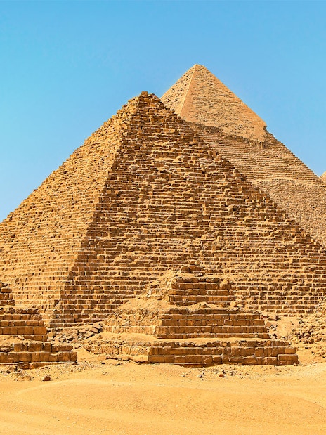 Giza Pyramids under clear blue sky in Egypt.