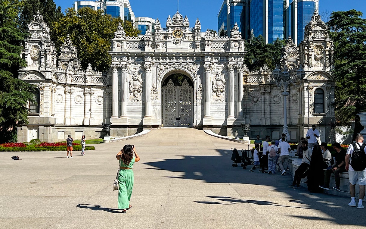 Visitors at Dolmabahce Palace exit gate in Istanbul.