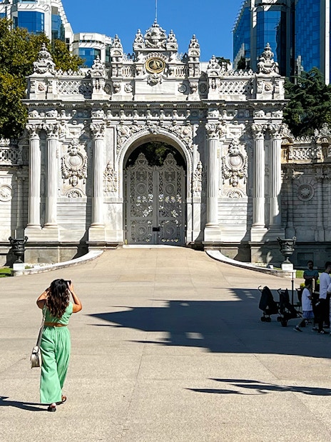 Visitors at Dolmabahce Palace exit gate in Istanbul.
