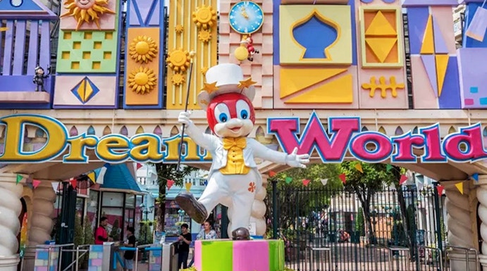 Dream World entrance with colorful architecture and character statue, Bangkok.