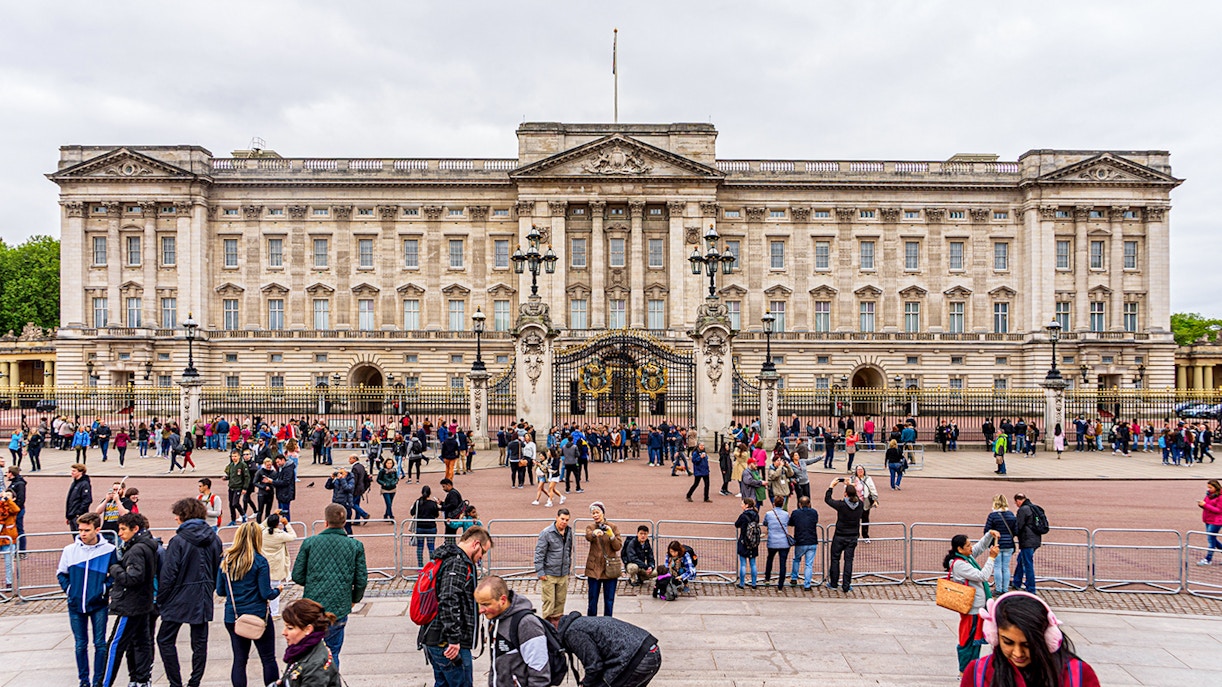 Crowds gather outside Buckingham Palace in London.