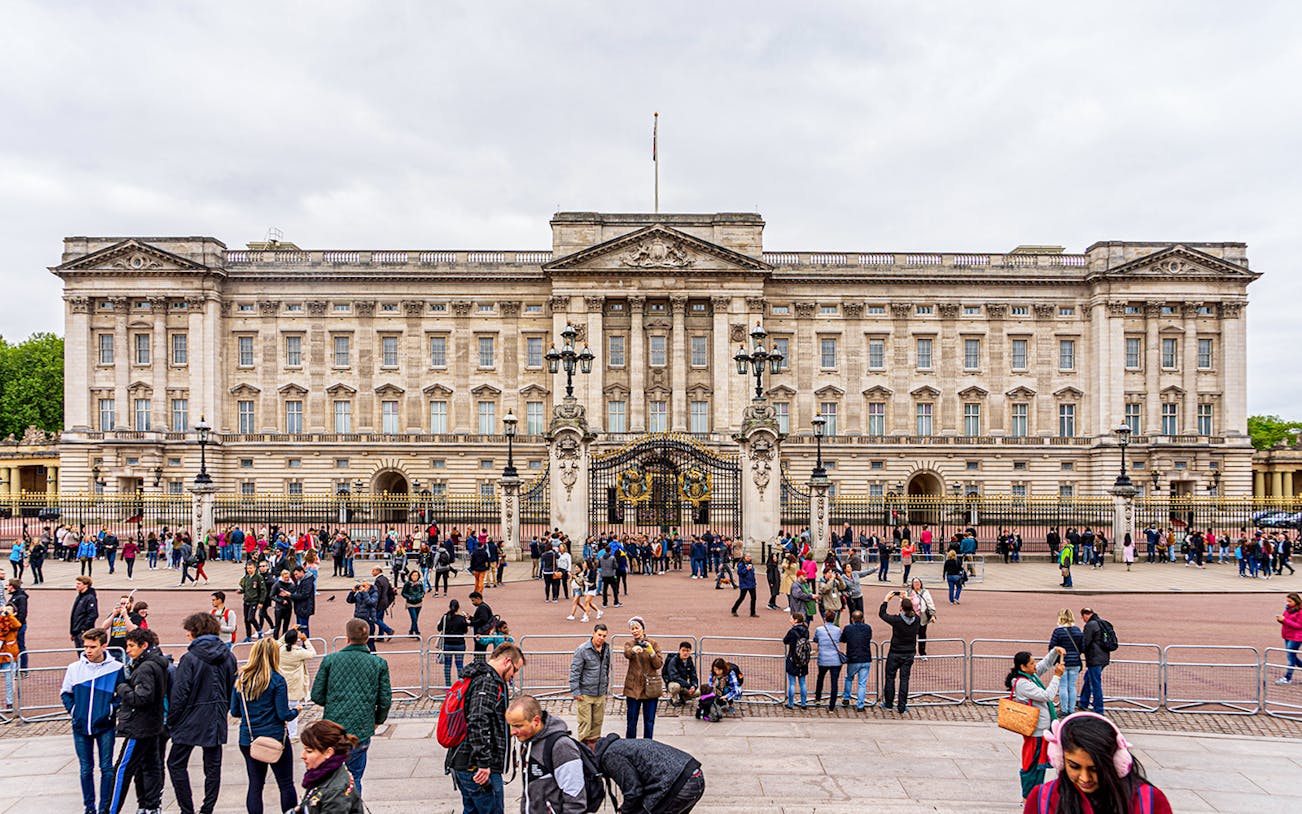 Crowds gather outside Buckingham Palace in London.